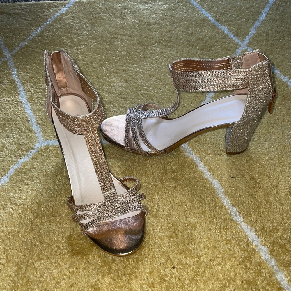 Rose gold studded sparkly strappy T-strap heels.